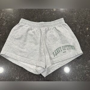 Sofia with an F Podcast Merch Gray Shorts